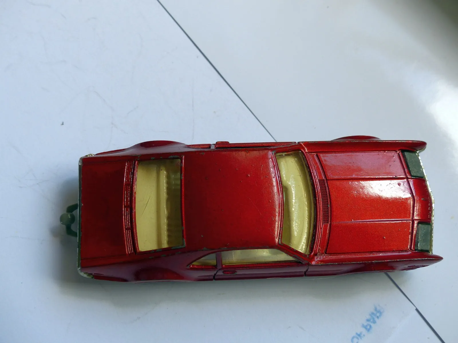 276 Oldsmobile Toronado in metallic red with original box
