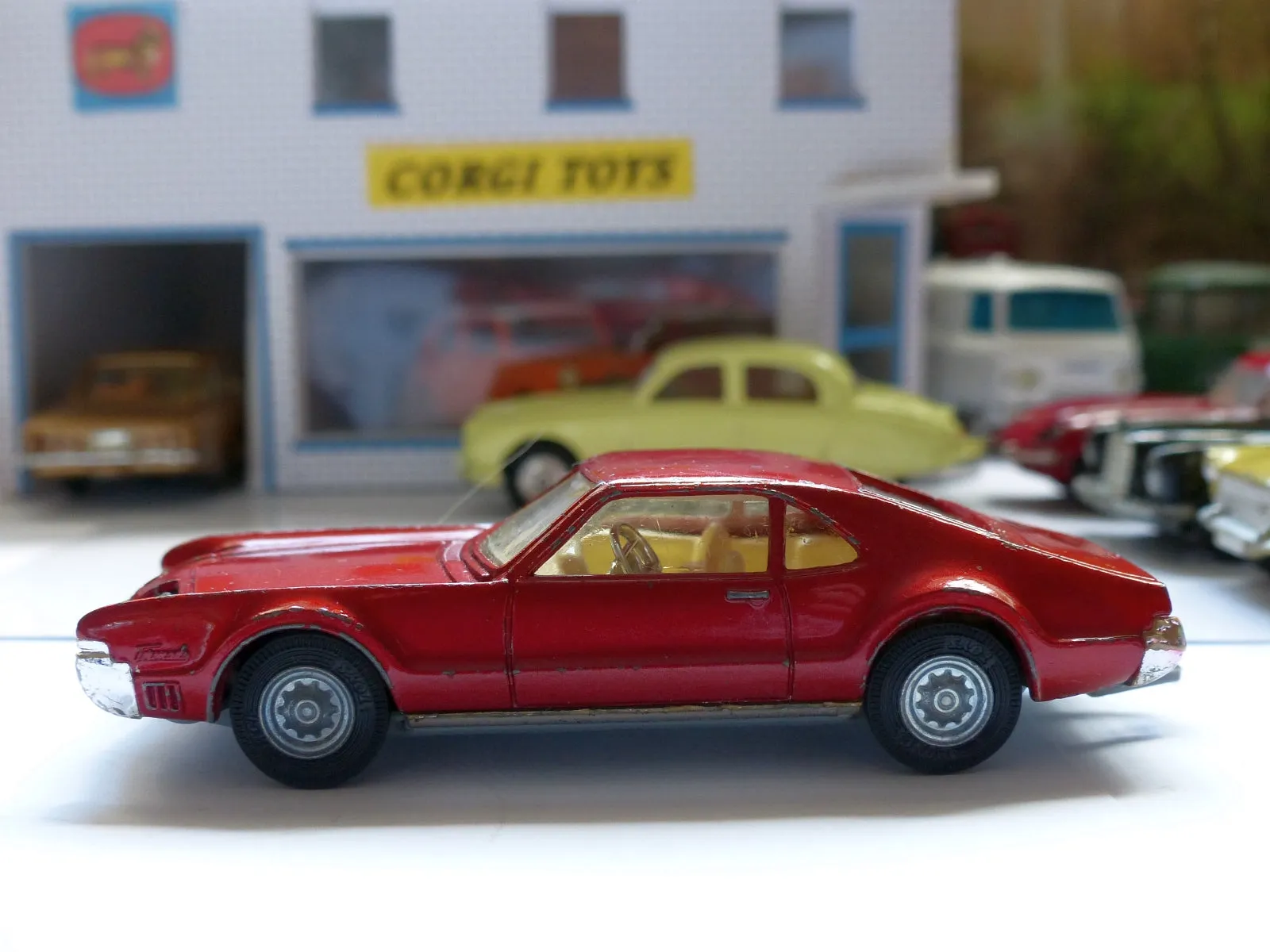 276 Oldsmobile Toronado in metallic red with original box