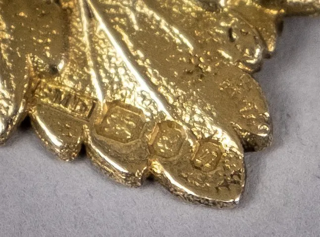 Four Silver Gilt Vine Leaf Decanter Labels by SMD, London, 1968.