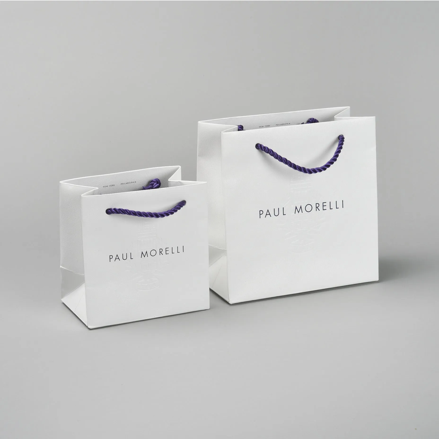Matching Paper Shopping Bag in White Skivertex