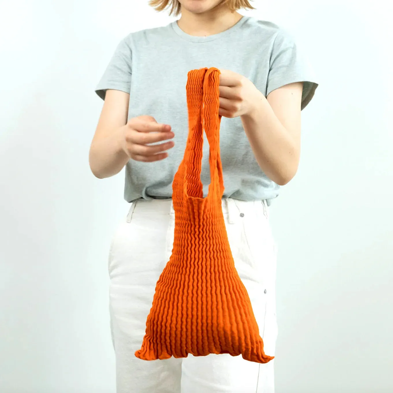 stretchy bag - mate mono - orange